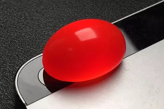 南紅瑪瑙鑒別強(qiáng)光圖片，怎樣鑒定南紅瑪瑙？